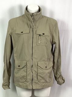 Eddie Bauer ladies-utility/safari jacket Size large Drawstring collar Rolled tab sleeves Four snap pockets-(one with a tiny zipper(see photos, upper left pool n Ruched  on the back at the waist line for some fullness-(adds  a feminine look) Zip front 100% nylon Like new condition Machine wash tag Travel Utility Jacket With Cargo Pockets, Utility Jacket With Multiple Pockets For Travel, Travel Utility Jacket With Multiple Pockets, Khaki Utility Jacket With Pockets For Travel, Casual Utility Jacket With Patch Pockets For Travel, Khaki Long Sleeve Utility Jacket For Travel, Khaki Utility Jacket For Travel In Spring, Khaki Utility Jacket For Spring Travel, Spring Khaki Utility Jacket For Travel