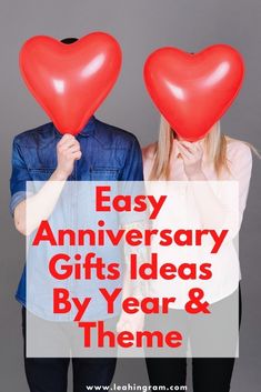 two people holding red heart balloons with the words easy anniversary gifts ideas by year & theme