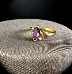 My Collection of Vintage rings from the Late 70's I have collected various rings over the years, but i think its time to share them with all of you!  RING INFO. * Size - 6 * .85 Carat Amethyst Natural Stone * 2 Diamonds are .05 Carat each  NOT YOUR SIZE? ›This ring can be resized to size 5, 7 or 8  ›Resizing this ring is included in the purchase price. On purchase, make sure to include the size you want it.  CUSTOMIZATION If this is a ring you like but you want to make it your own, contact me to Vintage Open Ruby Ring For Formal Occasions, Vintage Cluster Ring With Accent Stones For Formal Occasions, Vintage Purple Sapphire Gemstone Ring, Vintage Purple Amethyst Ring For Anniversary, Collectible Vintage Sapphire Ring, Vintage Marquise Gemstone Cluster Ring, Antique Rings With Accent Stones, Vintage Yellow Gold Cluster Ring With Accent Stones, Vintage Amethyst Ring With Accent Stones For Anniversary