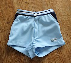 Vintage 80's, very nice sporty shorts, light blue polyester jersey fabric with navy details, elasticated waist, made in Italy.  Size 4/6/8/12 years  Vintage condition level 5, new old stock ( washed once ) We assess the condition of our vintage items on a scale from 0 to 5. Level 5 corresponds to an almost new vintage condition. Any defects are systematically reported. Even though in very good condition, vintage items may present imperfections due to their age, which mainly adds to their charm. Sporty Swim Trunks With Built-in Shorts For Play, Sporty Fitted Shorts For School, School Stretch Shorts, Retro Short School Bottoms, Retro Short Length School Bottoms, Sporty Stretch Shorts For Playwear, Blue Shorts For School In Summer, Elastic Stretch Shorts For School, Sporty Light Blue Cotton Shorts