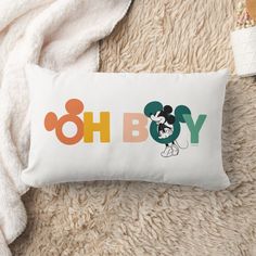 a mickey mouse pillow with the word oh boy on it