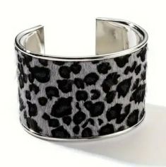 Snow Leopard Print Textured Cuff Bracelet With Silver Accents Offers Encouraged Features: A Textured Snow Leopard Print Patterned Material On A Cuff Bracelet With Silver Accents. Condition: New Without Tag Color: Black & White Snow Leopard Print Pattern Bundle To Save Or Make An Offer If You Love The Item, But Not Necessarily The Price. I Accept Reasonable Offers Top-Rated Seller Super Fast Shipping Trendy Silver Cuff Bracelet, Black Cuff Bangle Bracelet, Trendy Black Cuff Jewelry, Trendy Black Bangle Cuff Bracelet, Silver Rope Bracelet, Snow Leopard Print, Blue Stone Bracelet, Amethyst Bracelet Beads, Multi Wrap Bracelet