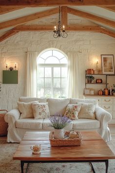 Shabby chic French-inspired living room with soft color palette distressed furniture and ornate molding Dreamy Living Room, French Country Bedrooms