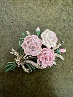 Stunning exquisite metal and enamel birthday brooch Elegant Silver Enamel Pin Gift, Silver Enamel Pin For Gift, Vintage Enamel Jewelry For Parties, Silver Enamel Brooch Pin, Enamel Brooch Lapel Pin Gift, Vintage Enamel Brooches For Anniversary, Elegant Flower Enamel Pin Collectible, Elegant Pink Brooches For Collectors, Silver Enamel Wedding Pin