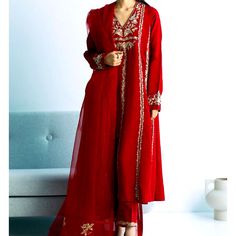 Zara Shahjahan Brand New It Is Currently Out Of Stock Size M Top:- Premium Rawsilk Bottom:- Premium Rawsik Dupatta:- Organza A Classic Deep Red Flared Ensemble With An Embroidered Front, Back, And Sleeves And Crystal Details Is Finished With An Embroidered Dupatta And Trousers. Traditional Chanderi Evening Set, Red Unstitched Sharara With Naqshi Detailing, Red Raw Silk Traditional Wear With Naqshi, Traditional Chanderi Sets For Evening, Red Sharara With Naqshi In Traditional Drape, Red Naqshi Sharara With Traditional Drape, Elegant Formal Sharara With Naqshi, Festive Silk Palazzo Set For Evening, Elegant Anarkali Set With Naqshi For Party