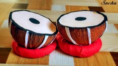 two wooden drums sitting on top of each other