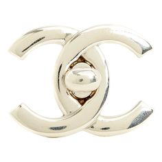 Chanel brooch SS1996 collection (!) with the motif of a large CC Chanel logo in silver metal, slanted pin on the back, signed. Width 3.8 cm x length 2.9 cm. The brooch has a few scratches from use but it is in very good vintage condition, delivered without invoice or original packaging, perfect on a jacket, a bag flap, as a belt buckle\. This piece has an attribution mark,   I am sure that it is completely authentic and  take full responsibility for any authenticity   issues arising from misattribution Luxury Silver Jewelry With Metal Logo, Silver Metal Jewelry With Logo, Silver Metal Jewelry With Metal Logo, Silver Elegant Enamel Pin For Formal Use, Silver Elegant Enamel Pin For Formal Events, Elegant Silver Enamel Pin For Formal Occasions, Elegant Silver Enamel Pin, Luxury Silver Pins For Formal Occasions, Formal Silver Enamel Brooch Pin