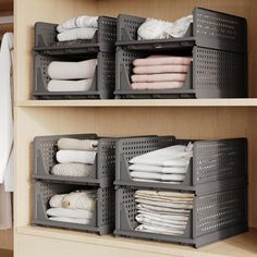 two shelves filled with folded and unpacked clothes