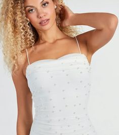 Showcase your class in this mesh mini dress as the bride-to-be or graduate! It features a sleeveless cowl neckline, adjustable spaghetti straps, a bodycon silhouette, and all-over faux pearl embellishments on the lined mesh fabric. Complete the look with dainty earrings. Elegant White Mesh Dress For Prom, Elegant White Mesh Prom Dress, White Fitted Mesh Prom Dress, White Fitted Mesh Dress For Prom, Fitted Sleeveless Mesh Dress For Wedding, White Sleeveless Mesh Prom Dress, Fitted Sleeveless Mesh Dress For Prom, White Sleeveless Tulle Mesh Dress, White Sleeveless Mesh Dress