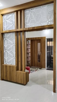 the inside of a building with wood trimmings and decorative panels on the walls