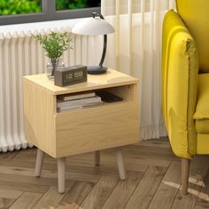 a small wooden table with a plant on it next to a yellow chair and window