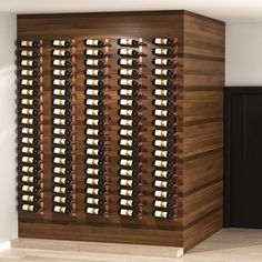 a wine rack in the corner of a room