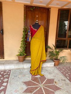 yellow buti georgette silk saree with hand embroidery Kalamkari blouse | silk saree with readymade blouse | sarees USA | pure light weight silk saree / red yellow saree with  stitched blouse / voggish / long sleeve maggam blouse      you are absolutely gonna fall in love with this unique modern  saree look with our stitched ready to wear blouses(includes the price) with a modern touch to them is perfect for your upcoming saree occassion that really makes you stand apart in crowd !!     You dont Yellow Semi-stitched Cotton Silk Saree, Georgette Pre-draped Saree With Mirror Work For Puja, Yellow Chinon Pre-draped Saree, Yellow Georgette Pre-draped Saree With Pallu, Yellow Pre-draped Saree With Cutdana, Yellow Pre-draped Saree With Resham Embroidery, Yellow Blouse For Puja During Diwali, Yellow Pre-draped Saree With Mirror Work For Wedding, Festive Yellow Pre-draped Saree With Mirror Work