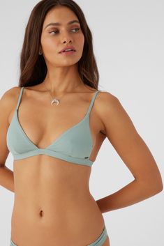 Soak up some sun in this solid tri-top bikini. It has a fixed design for added support. O'Neill Women's tri top bikini Saltwater Solids Collection Adjustable straps Three point back hook closure Removable bra pads O'Neill Blue: 85% Recycled Polyamide, 15% Elastane Tactel | O'Neill Women's Saltwater Solids Seaside Triangle Top in Silver Blue, Size Medium, Elastane/Polyamide Padded T-back Swimwear For Beach Season, Low-cut Swimwear With Adjustable Straps For Swimming, Low-cut Swimwear With Adjustable Straps, Beach Low-cut Bra With Adjustable Straps, Low-cut Bra With Adjustable Straps For Beach, Adjustable Low-cut Bra For Beach, Beachwear Swimwear With Removable Bra Pads And T-back, Low-cut Swimwear With Adjustable Straps For Pool, Solid Color Triangle Top For Sunbathing