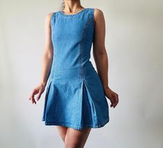 vintage blue denim mini dress,MOD style denim skater dress *size: xxs-xs *measurements (centimeters) bust 76 waist 62 hips 82, length 80 *condition: great vintage condition *fabric: cotton *washing instructions: gently hand wash in cool water or dry clean it Please make sure you check all the measurements of the item before purchasing. Vintage garment sizes are not the same as those of today. To ensure your best fit it's best you measure yourself or a similar item. The size listed it's an approx Fitted Mini Length Denim Dress, Vintage Cotton Denim Mini Dress, Vintage Summer Denim Mini Dress, Vintage Denim Mini Dress, Summer Vintage Denim Mini Dress, Blue Denim A-line Mini Dress, Fitted Blue Vintage Denim Dress, Fitted Vintage Blue Denim Dress, Blue A-line Denim Mini Dress