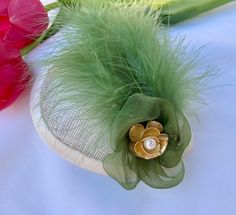 "A new concept in head coverings for women, this beautiful handmade She*ppah puts a feminine twist on the traditional kippah. The teardrop fascinator is lightweight, with comfortable clips that stay put all day.  Each hairpiece is unique. COLOR: Green, Olive, Ivory, Cream MEASUREMENTS: 5.5\" x 6.0\" (approximately) I created the She*ppah to offer a feminine counterpart that is elegant and versatile. The unique design of these fascinators allows you to wear them multiple ways, while the fascinato Elegant Hair Accessories For Spring Ceremonies, Elegant Spring Ceremony Hair Accessories, Wedding Hair Accessories With Feather Trim For Kentucky Derby, Gold Wedding Fascinator With Feathers, Elegant Wedding Hair Accessories With Feather Trim, Elegant Green Feathered Headpieces, Elegant Green Mini Hat With Feathers, Green Feathered Mini Hat For Wedding, Green Mini Hat With Feathers For Wedding