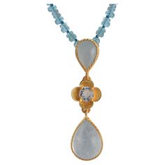 A beautiful limited edition cabochon aquamarine teardrop pendant. Handmade in our workshops, the pendant has matching earrings and a ring and is made in sterling silver coated with 24k gold plate. It comes with a 26 inch apatite beaded chain. 48mm long from top of pendant hook x 10mm wide This collection was launched at London Fashion Week S/S 2023. Silver Coat, Teardrop Pendant, London Fashion, Beaded Chain, London Fashion Week, Matching Earrings, Aquamarine, Jewelry Necklace Pendant, Gold Plate