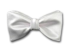 Formal white bow tie from our bow tie plain collection. Tuxedo bow tie. Perfect for your special occasion. Color: White Material: Japanese satin silk Bow dimensions: 4.5'' x 2.5'' Pre-tied bow tie neck size: Adjustable 14" - 22" Freestyle (self-tie) bow tie neck size: Adjustable 14" - 18" Made in USA Label: Kotty Design Code: FC1003 GIFT IDEA FOR HER: https://www.kottystyle.com/ White Tuxedo For Black Tie Event, Elegant White Suit And Tie Accessories For Party, Classic Bow Tie With Butterfly Knot, Classic Satin Bow Tie For Gift, Classic Satin Bow Tie As A Gift, Classic White Tie For Wedding, Classic White Tuxedo For Black Tie Events, Classic White Tuxedo For Black-tie Events, Classic White Suit And Tie Accessories For Gift