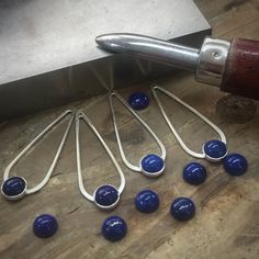 Today I’m setting lapis lazuli cabochons in sterling silver teardrop earrings. The next step will be polishing and making the ear wires. Modern Teardrop Pendant Jewelry With Ear Wire, Minimalist Blue Teardrop Jewelry, Sapphire Drop Beads For Jewelry Making, Nickel Free Teardrop Earrings As Gift, Blue Teardrop Cabochon Jewelry, Sterling Silver Teardrop Cabochon Earrings, Sapphire Teardrop Earrings For Gift, Silver Cabochon Teardrop Earrings, Blue Cabochon Drop Jewelry