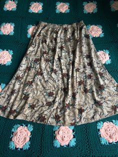 adorable Y2K vintage skirt. Size- 1X. Brand- S.A Designs. Adorable floral pattern. Warm neutral colors. Very cute! Great condition! Patterned Floral Print Long Skirt, Patterned Long Skirt With Floral Print, Brown Flowy Floral Print Skirt, Flowy Brown Floral Print Skirt, Flowy Brown Skirt With Floral Print, Brown Flowy Skirt With Floral Print, Vintage Floral Print Maxi Skirt, Vintage Floral Print Long Maxi Skirt, Beige Floral Print Midi Skirt