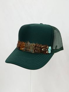 feather border trucker hat with turquoise stones in forest green Custom Cowboy Hat Ideas, Feather Trucker Hat, Custom Trucker Hat Ideas, Trucker Hat Bar Ideas, Simply Jules, Oyster Ideas, Black Date Night Outfit, Feather Hats, Bling Hats