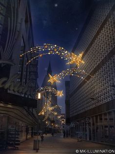 an image of a city street at night with lights on the buildings and people walking around