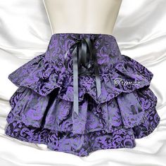 Size Small.New With Tagretail $59 I Have Available A Stunning Widow Brocade Purple & Black Mini Skirt That Has A Satin Brocade Construction, A Layered Ruffle Design, A Satin Ribbon Lace Up In Front, And A Sheer Tulle Under Layer. Machine Washable. Matching Corset Top Shown Pictured Above Available Until Sold Size Large. 23300002 Waist Is 13”, Length Is 16” ****All Photos Are Taken By And Property Of Trimzz. Please Ask Any Questions Before Purchase As All Sales Are Final. All Items Are Shipped Fr Egirl Skirt, Genshin Clothes, Layered Lace Skirt, Drawing Outfits, Character Clothes, Reference Drawing, Ruffle Design, Purple Skirt, Layered Skirt