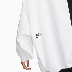 When oversized just isn't big enough, the ultimate comfortable layer. The Nike Over-Oversized Sweatshirt is baggy through the body and hips, allowing enough room to go over any outfit. A spliced-color design updates a soft favorite to put added emphasis on the Swoosh logo. Extra oversized Ribbed collar, cuffs and hem Long fit 80% cotton / 20% polyester Color: Black White Style: DV0328-010 Sporty Oversized Drop Shoulder Sweatshirt, Oversized Sporty Sweatshirt With Drop Shoulder, Oversized Drop Shoulder Sporty Sweatshirt, Nike Oversized Sportswear Sweatshirt, Nike Oversized Sweatshirt For Loungewear, Oversized Drop Shoulder Sweatshirt For Sports, Nike Oversized Long Sleeve Top, White Nike Urban Sweatshirt, Nike Urban Style White Sweatshirt