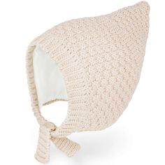 a white knitted hat with a bow on the side