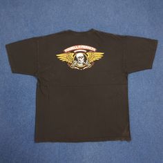 Kindly read description below carefully before buying. If any questions feel free to ask. 𝐈𝐍𝐅𝐎𝐑𝐌𝐀𝐓𝐈𝐎𝐍 Tag Brand : Powell Peralta Made : Mexico Size on Tag : XL Materials : Cotton 𝐌𝐄𝐀𝐒𝐔𝐑𝐄𝐌𝐄𝐍𝐓 Armpit to armpit : 24 inch Length : 29 inch Shoulders : 23 inch Sleeve Length : 8.5 inch *All measurements were taken lying flat. 𝐂𝐎𝐍𝐃𝐈𝐓𝐈𝐎𝐍 Used item, see at the picture for defect or something else. *Please don't expected the all items to be like new or in pristine condition. This is used/vintage item from the past. Beauty by the age ! ! ! 𝐒𝐇𝐈𝐏𝐏𝐈𝐍𝐆 & 𝐍𝐎𝐓𝐈𝐂𝐄 Item will be ship 7-9 working days via 'FEDEX EXPRESS' with tracking number'. Fast delivery it only take 3-5 working days . Fast shipping just for price above 100$ or Weight above 400g.. If below price 1 Powell Peralta, Skate T Shirts, Vintage Tshirts, Graphic Tees, Adult Outfits, Like New, Tops & Tees, Top Outfits, T Shirt