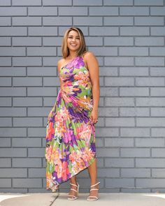 Be the life of the party in our Joyful Jubilee Dress! This one shoulder maxi features a playful floral print and an asymmetrical hem for a unique twist. The side keyhole detail and hidden zipper closure make it both stylish and practical. Perfect for a special night out. (Model is 5'5" and wearing size Small.) FD10589 Life Of The Party, Asymmetrical Hem, Asymmetric Hem, Hidden Zipper, Night Out, One Shoulder, Floral Print, Floral Prints, Twist