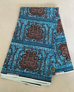 High Quality African Fabric Prints are known to be the best cotton print used in clothing, and great for crafts and any home goods projects. Chitenge baby wrap 2 yards M/L and 3 yards plus size ($14.05 more) , multiple use. Material : 100% Cotton Measurements: 1 yard = 36 inches long, 43 inches wide 2 yards= 72 inches long, 43 inches wide 3 yards = 108 inches long, 43 inches wide Cotton Batik Print Fabric, Patterned Batik Print Cotton Fabric, Multicolor Cotton Batik Print Patterns, Patterned Cotton Fabric With Batik Print, White Cotton Fabric With Batik Print, Cotton Block Print Patterned Fabric, Patterned Block Print Cotton Fabric, Colorful Patterned Cotton Fabric, Patterned Batik Print Fabric