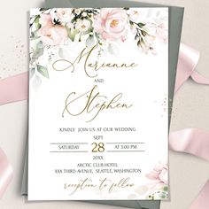 an elegant wedding card with pink flowers and gold foil on the front, is shown