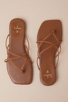 You better not pack your vacation bags without including the Lulus Gillie Chestnut Leather Strappy Flat Thong Sandals! The sun-loving sandals have a genuine leather construction that creates a flat square-toe upper, a network of strappy details that come together to form a toe thong, and an easy slide-on design. 0. 25" rubber heel. Smooth insole. Rubber sole has nonskid markings. Genuine leather upper. Balance man made materials. Imported. Lulus | Gillie Chestnut Leather Strappy Flat Thong Sanda Strappy Flat Sandals, Vacation Bag, Chestnut Leather, Strappy Sandals Flat, Strappy Flats, Ageless Style, Flats Sandals, Sandal Heels, Size 11 Heels