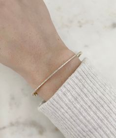 14K Solid Gold 0.24 Carat Diamond (VS2-SI G-H) Bangle will fit a wrist size up to 6.75 inches and is 1MM wide Classic Single Cut Diamond Cuff Bangle Bracelet, Classic Single Cut Diamond Cuff Bangle, Classic Hand-set 14k Gold Bangle, Classic 14k Gold Hand Set Bangle, Classic Everyday Luxury Bangle With 17 Jewels, Luxury Everyday Round Cuff Bracelet, Luxury Flexible Bangle Cuff Bracelet, Luxury Flexible Bangle For Anniversary, Flexible Luxury Bangle For Anniversary