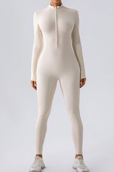 Half Zip Mock Neck Active Jumpsuit – BELLATRENDZ Solid Compression Nylon Unitard, Long Sleeve Compression Bodysuit, Sporty Solid Color Unitard, Solid Stretch Nylon Unitard, Solid Color Sporty Elastane Unitard, Stretch Moisture-wicking Solid Unitard, Solid Moisture-wicking Stretch Unitard, Moisture-wicking Stretch Unitard, Fitted Moisture-wicking Jumpsuits And Rompers