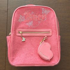 Juicy Couture Pink Terry Cloth Backpack, With Butterfly Detail. Pink Faux Leather Coin Purse. Never Used. New, Without Tags. Faux Leather Coin Purse, Cloth Backpack, Backpack Outfit, Juicy Couture Bags, Couture Bags, Leather Coin Purse, Terry Cloth, Juicy Couture, Coin Purse