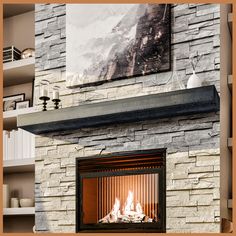 a fireplace with a painting on the wall above it