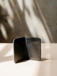 You'll find just the right balance between compactness and capacity with the Freddie Leather Card Wallet. Providing ample space for your cards, ID, and currency essentials while maintaining a slim profile that effortlessly fits into any pocket - this wallet is designed to meet the needs of the modern individual. The natural variations in the leather's texture and color lend each wallet a distinct character, making it a truly unique accessory. 4 card slots 1 pocket for ID 2 cash slots 4” H x 0” D Versatile Rectangular Wallet With Rfid Blocking, Functional Leather Trifold Wallet, Versatile Trifold Wallet With Card Slots, Versatile Trifold Wallet With Interior Card Slots, Versatile Rectangular Rfid Blocking Wallets, Functional Trifold Wallet With Interior Card Slots, Functional Rectangular Trifold Wallet With Card Slots, Functional Bifold Card Holder With Card Slots, Functional Bifold Card Holder For Everyday Use