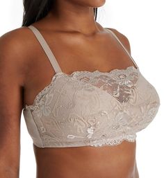 When you want the look of a camisole without the bulk, this wireless cami bra is the answer. Designed for the plus-size as well as the average-size woman, this lace-trimmed beauty looks great peeking out from beneath blouses and tops, and can make any outfit office-appropriate. Multi-part, wireless cups have a beautiful lace overlay on very light foam padding for no nipple show-through. Elastic underband provides excellent support. Wide inner center panel is great for wide-spaced breasts. Elasti Beige Spaghetti Strap Bra-friendly Camisole, Lace Tops With Underwire And Bra Friendly Design, Camisole Bra With Medium Bust Support, Elegant Tops With Adjustable Straps And Underwire, Camisole With Removable Bra Pads, Beige Bra-friendly Camisole, Lace Camisole Bra With Adjustable Straps, Elegant Full Coverage Seamless Camisole, Elegant Full Coverage Camisole