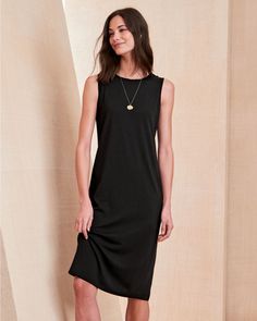 This sleeveless midi dress by Eileen Fisher features a flatters-all silhouette, a modern midi length, and fluid, jersey-knit TENCEL Lyocell with a hint of perfect-fit stretch. Relaxed fit. Pull-on style. Crew neckline. Sleeveless. Midi length. TENCEL Lyocell/elastane. Women's stretch jersey crew neck sleeveless midi dress by Eileen Fisher for Garnet Hill. Affordable Sleeveless Rayon Midi Dress, Cheap Sleeveless Midi Dress For Fall, Jersey Dress Black, Midi Black Dress, Eileen Fisher Dress, Jumper Style, Sleeveless Midi Dress, Garnet Hill, Stretchy Dress