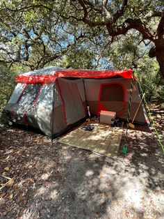 a tent is pitched up in the woods