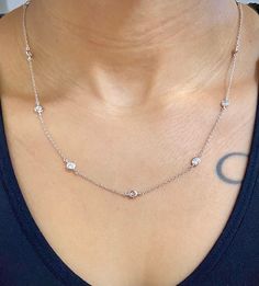 "Trendy Diamond By The Yard Necklace made of 925 sterling silver with a high polish 14K white gold or rose gold finish. It features high quality bezel set cubic zirconia stones every 1.5\" throughout. White gold- 18\" adjustable to 16\" & 17\" Rose Gold- 18\" ONLY How to care for your gold plated sterling silver jewelry: To clean your gold plated jewelry, use a soft cotton ball or a very soft cloth to remove any dust or dirt. This will clean and restore shine to your piece. Once you clean it Necklace Silver Diamond, Diamond By The Yard, Silver Diamond Necklace, Bezel Necklace, Diamond Solitaire Necklace, Platinum Jewelry, Necklace Diamond, Solitaire Necklaces, Station Necklace