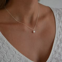 "Timeless, Simple & Delicate Bridesmaid Pearl Necklace in Sterling Silver 925. Looking for: - a Stunning Pearl Necklace for every day wear - a Gift for your Bridesmaids or - a Feminine Elegant Necklace for Her as a gift Whatever the reason may be, this pearl necklace is perfect for every occasion. This pearl necklace is the PERFECT GIFT for every Woman. So delicate and feminine. Looking for a matching set of pearl earrings or a pearl bracelet? See our Pearl Collection --> https://etsy.me/3dUpk5h Simple Pearl Necklace Wedding, Silver Pearl Necklace Simple, Silver Necklaces Dainty, Simple Bride Necklace, Silver Pearl Necklaces, Wedding Necklace Silver, Silver Necklace With Pearl, Dainty Pearl Necklace Silver, Dainty Silver Necklaces