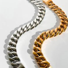 Make a statement with our bold Icon Chain Necklace, available in striking silver and luxurious gold finishes. Crafted from durable stainless steel, this necklace exudes confidence and style. The chunky chain design adds an edgy flair to any outfit, whether you're dressing up for a night out or adding some attitude to your everyday look. Reflect your unique personality and elevate your jewelry game. Stand out from the crowd with our Icon Chain Necklace and unleash your inner icon. Silver or 18k G Game Stand, Chain Design, Anklet Bracelet, Anklet Jewelry, Silver Chain Necklace, Ring Collections, Steel Water, Earring Necklace, Ring Necklace