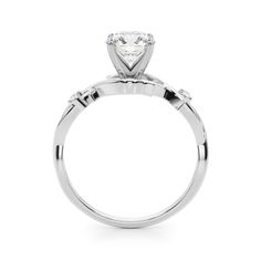 This elegant ring features 1/20 ctw. of dazzling diamonds that extend down the band. A 0.01 ct. or larger round shape stone can be set with this ring. Fine Jewelry Rings With Prong Setting And Open Band, Timeless Solitaire Diamond Ring For Proposal, Diamond Solitaire Halo Ring, 14k White Gold Diamond Ring With Tension Setting, Timeless Rings With Center Stone For Proposal, Timeless Diamond Ring With Round Band For Proposal, Timeless Proposal Rings With Center Stone, Timeless Round Diamond Ring, Timeless Round Band Diamond Ring For Proposal