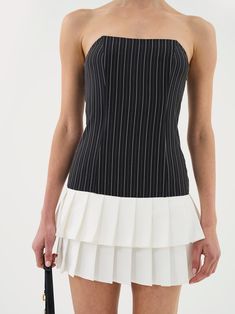 PRODUCT DETAILS 2 in 1 style Bandeau Pleated mini skirt Button features FABRIC AND FIT Model wears size UK 8 and is 5'9 SHELL: 95% Polyester 5% Elastane LINING: 100% Polyester STYLE NOTES: This simple, yet show stopping piece features, an elegant and flattering fitting bodice finished with a feminine touch in the pleated maxi. Striped Fitted Mini Dress Lined, Striped Fitted Mini Dress With Lining, Fitted Striped Lined Mini Dress, Elegant Mini Dress With Vertical Stripes, Elegant Striped Mini Skirt For Spring, Elegant Summer Mini Dress With Vertical Stripes, Chic Striped Fitted Mini Skirt, Fitted Vertical Stripe Mini Skirt For Spring, Fitted Mini Dress With Vertical Stripes For Summer