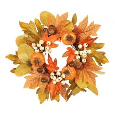 a wreath with leaves, berries and acorns on it is ready to be decorated