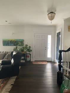 the living room is clean and ready to be used as an office or family room