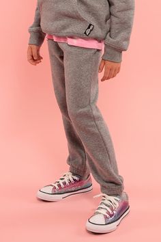 Heather Grey Relaxed Fit Joggers With Elastic Cuffs For Jogging, Solid Color Relaxed Fit Tracksuit Athleisure, Sporty Tracksuit For Leisure, Gray Casual Winter Tracksuit, Solid Color Activewear With Drawstring For Jogging, Solid Sportswear Sweats With Ribbed Waistband, Sports Cotton Tracksuit, Solid Color Fleece Sweats For Sportswear, Fleece Sweats In Sportswear Style